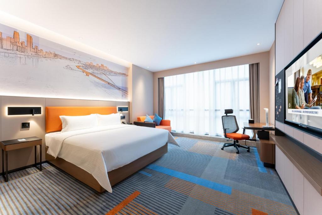 TV a/nebo společenská místnost v ubytování Hampton by Hilton Guangzhou Jinshazhou