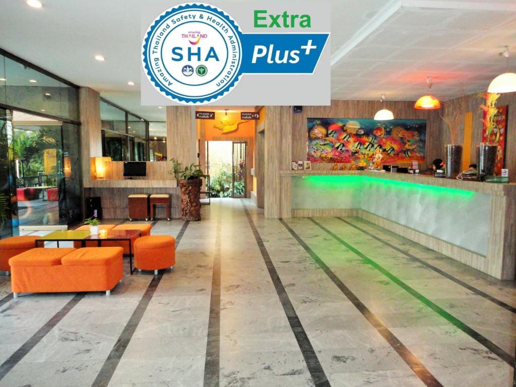 a bowling alley in a restaurant with a bowling ball at La Moon At Phuket - SHA Extra Plus in Phuket