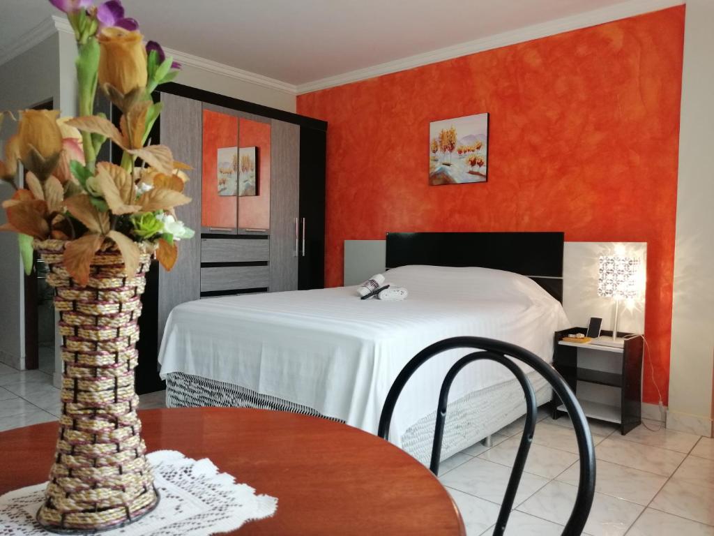 Posteľ alebo postele v izbe v ubytovaní Dorado Hotel