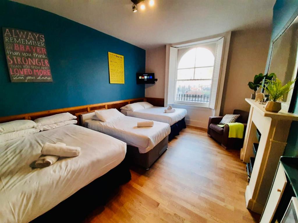 Un ou plusieurs lits dans un hébergement de l'établissement KX Rooms Kings Cross