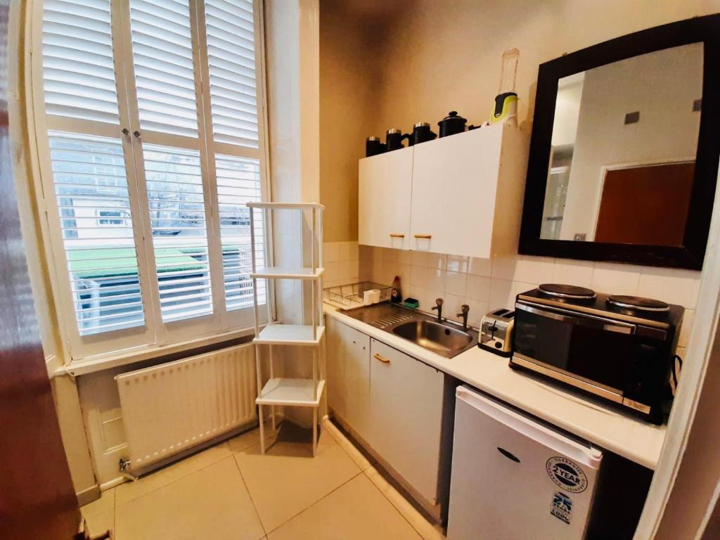 Cuisine ou kitchenette dans l'établissement KX Rooms Kings Cross