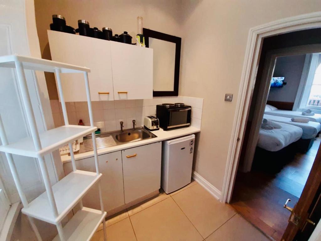 Cuisine ou kitchenette dans l'établissement KX Rooms Kings Cross