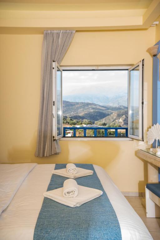 Postel nebo postele na pokoji v ubytování Astoria Hotel