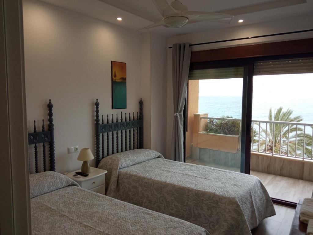 Posteľ alebo postele v izbe v ubytovaní Playa Marbella