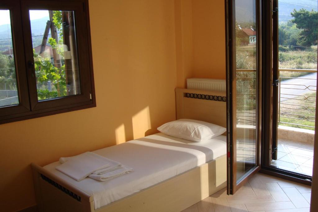 Postel nebo postele na pokoji v ubytování Villa Elva