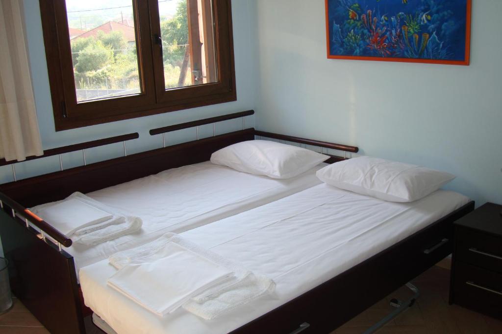 Postel nebo postele na pokoji v ubytování Villa Elva