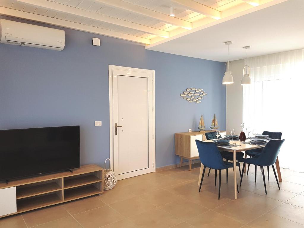 TV a/nebo společenská místnost v ubytování Tamaris Homes