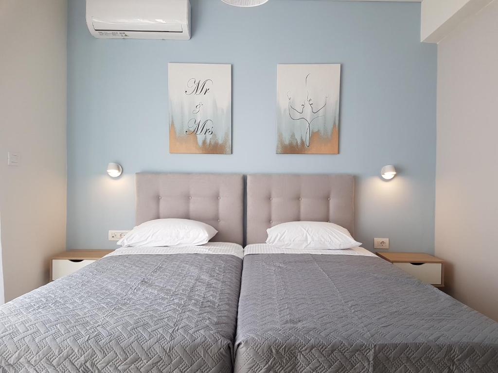 Postel nebo postele na pokoji v ubytování Tamaris Homes