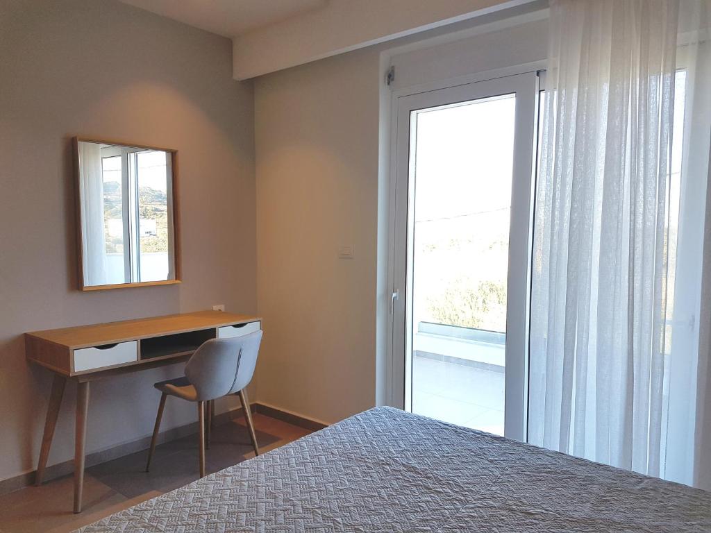 Postel nebo postele na pokoji v ubytování Tamaris Homes