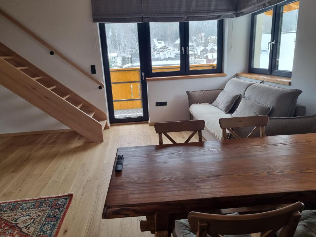 Posedenie v ubytovaní Apartamenty u Kołodzieja