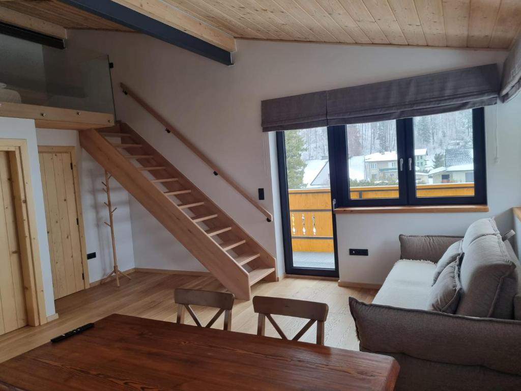 Posedenie v ubytovaní Apartamenty u Kołodzieja