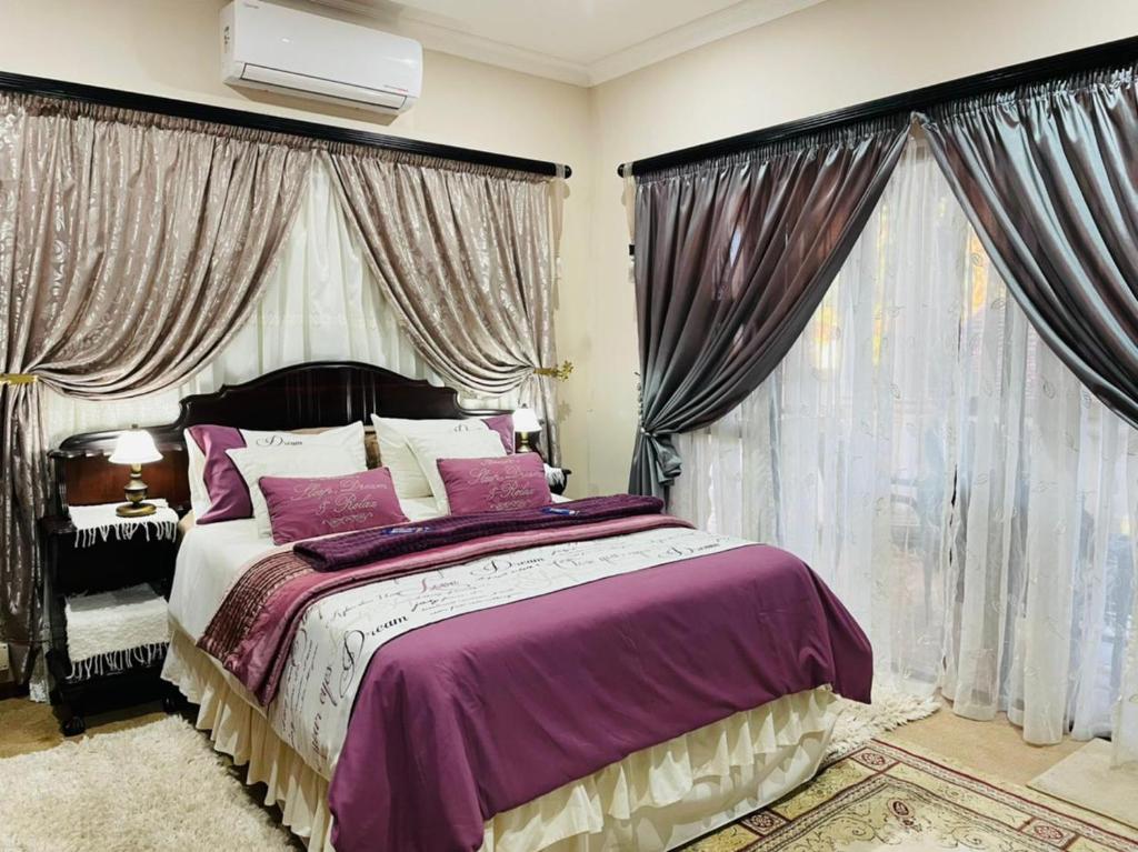 Postel nebo postele na pokoji v ubytování Casa Alegre Guesthouse