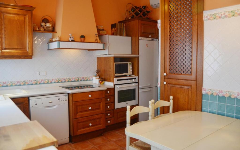 Kuchyň nebo kuchyňský kout v ubytování Valencia Green Penthouse