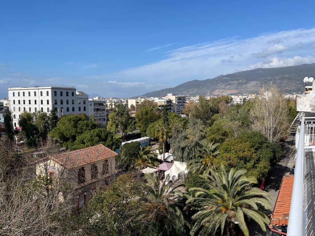 a view of a city with buildings and trees at ParkSide Loft in Kalamata