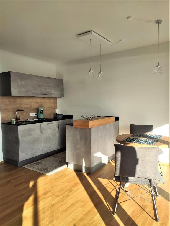 Kuchyň nebo kuchyňský kout v ubytování Hecklers Seepanorama Appartements