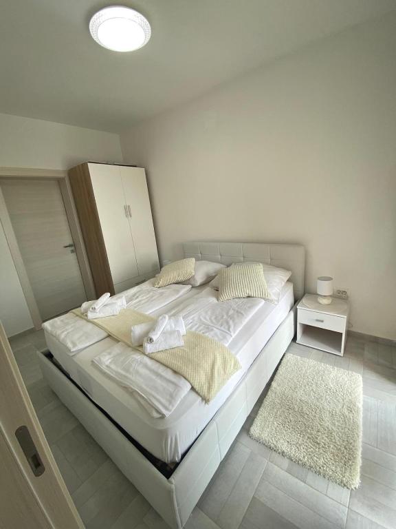 Postel nebo postele na pokoji v ubytování Villa Diana