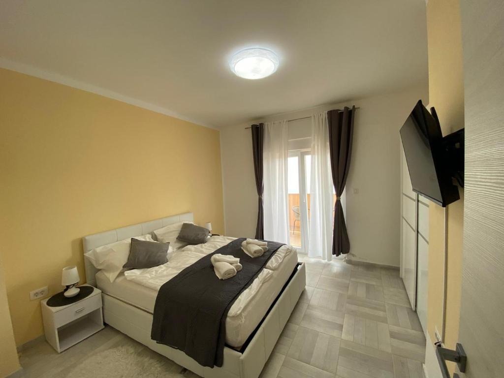 Postel nebo postele na pokoji v ubytování Villa Diana