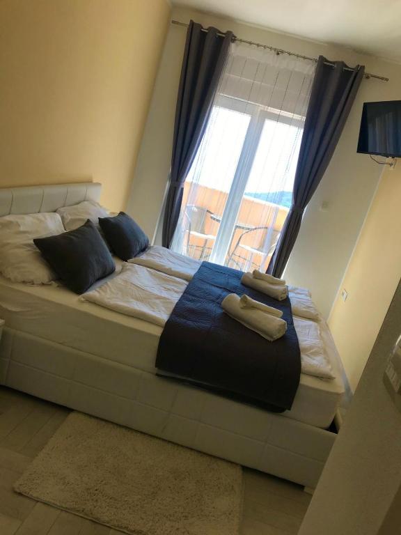 Postel nebo postele na pokoji v ubytování Villa Diana