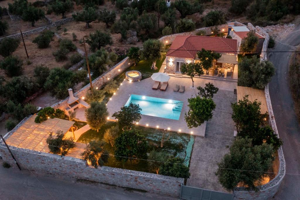 an overhead view of a house with a swimming pool at Mani Luxury Villa with Private Pool in Khalíkia