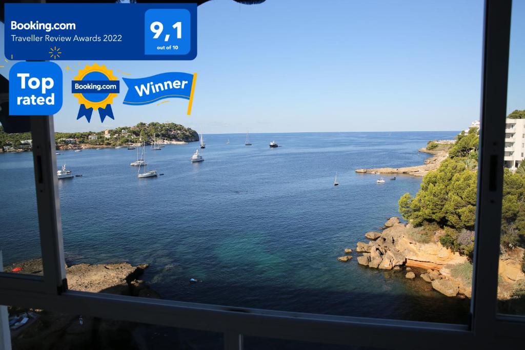 a view of a river with boats in the water at Apartment with a great sea view in the best location of Santa Ponsa in Santa Ponsa