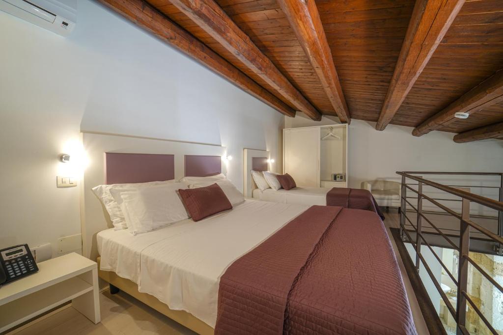 A bed or beds in a room at Life Hotels Kalaonda Resort