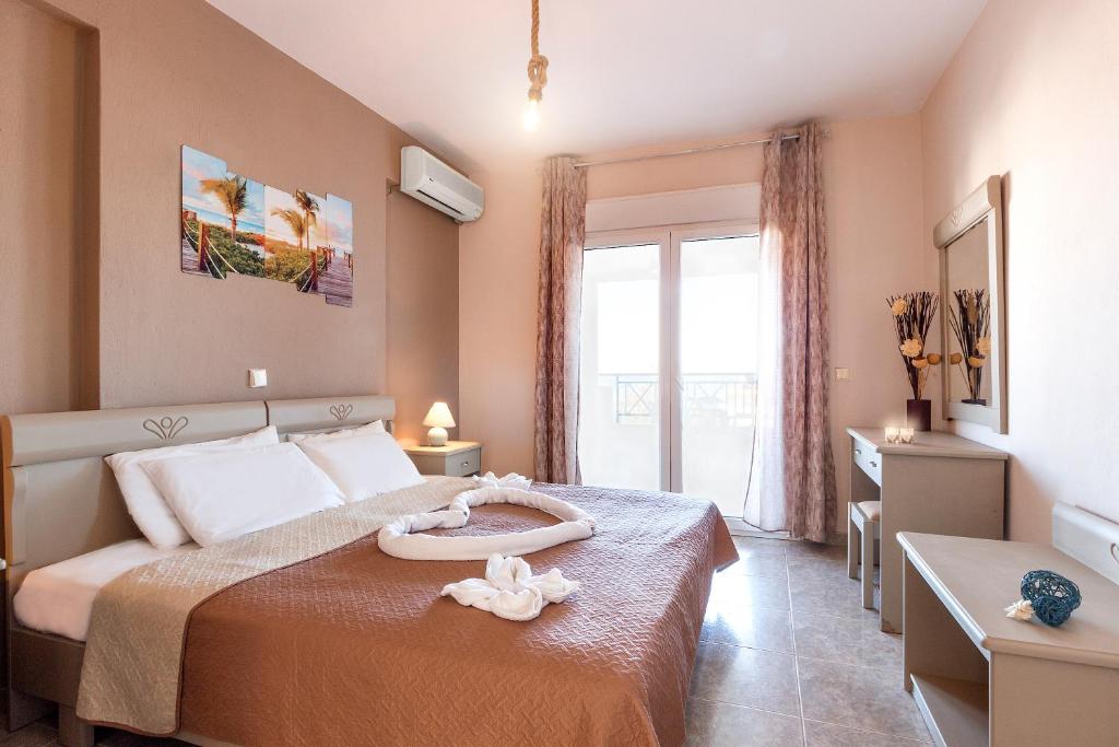 Postel nebo postele na pokoji v ubytování Sueño beach hotel