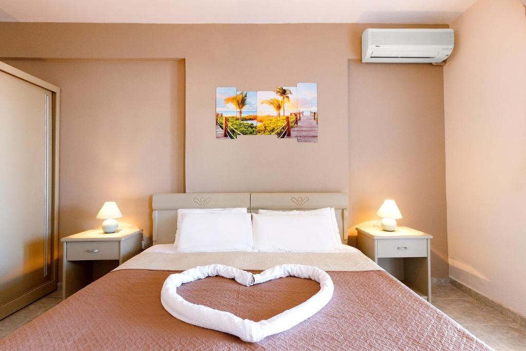 Postel nebo postele na pokoji v ubytování Sueño beach hotel