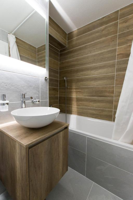Koupelna v ubytování Appartements dans la Résidence Panorama