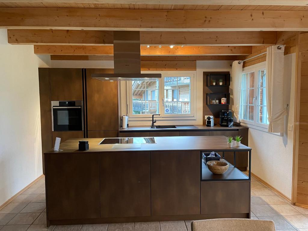 Kuchyň nebo kuchyňský kout v ubytování Chalet Inge