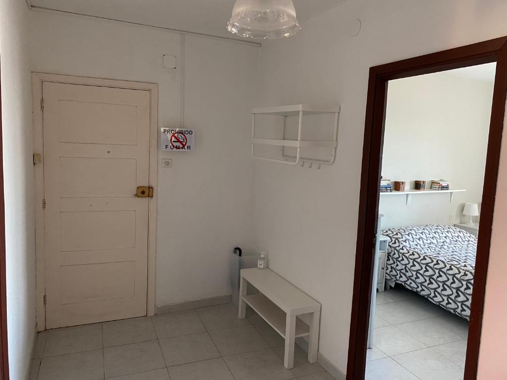 A bed or beds in a room at Apartamento en las Rias Bajas
