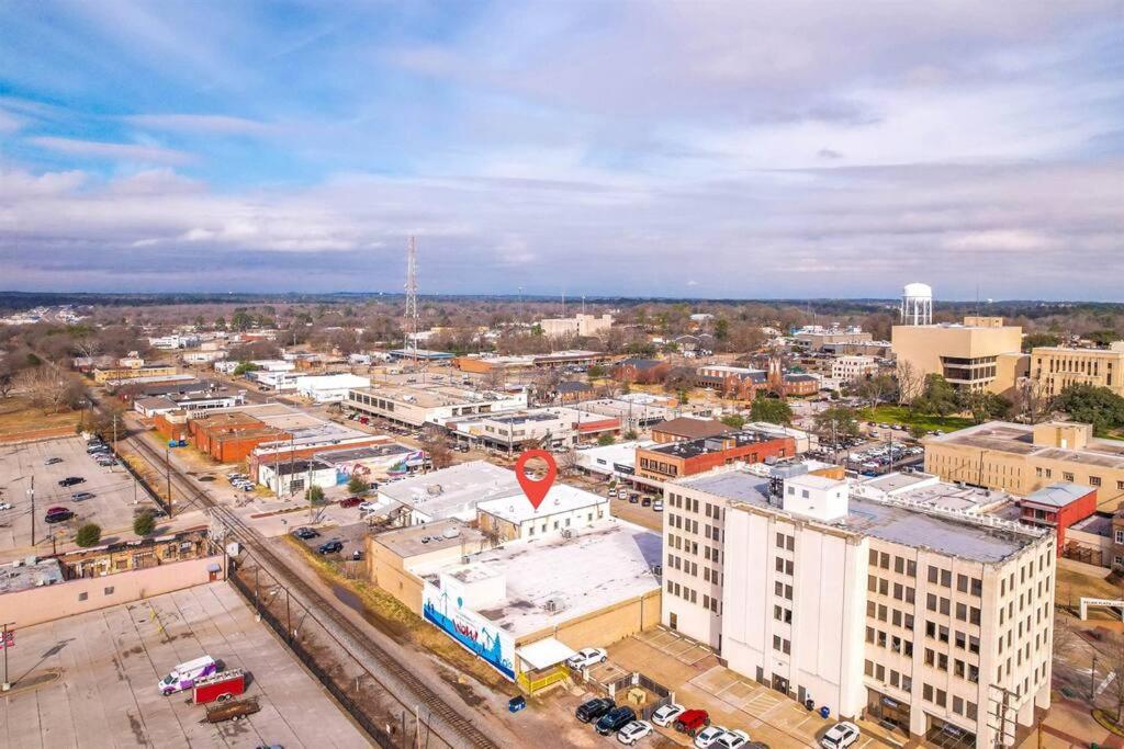 an aerial view of a city with buildings at Dottie's Loft 202 in Longview