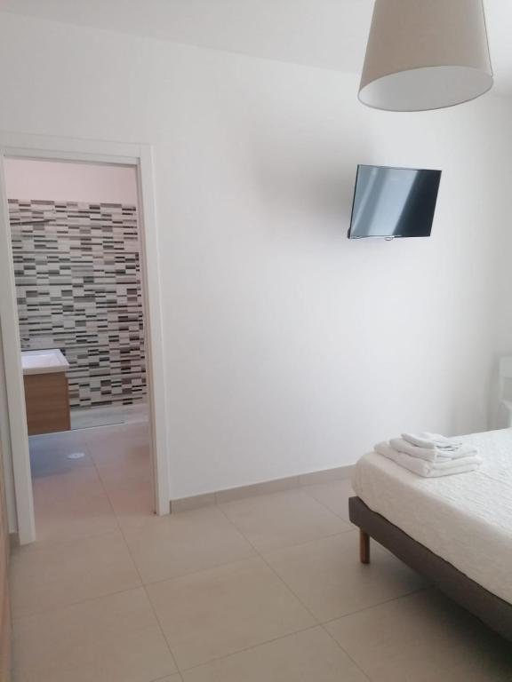 Posteľ alebo postele v izbe v ubytovaní Residence Chanel