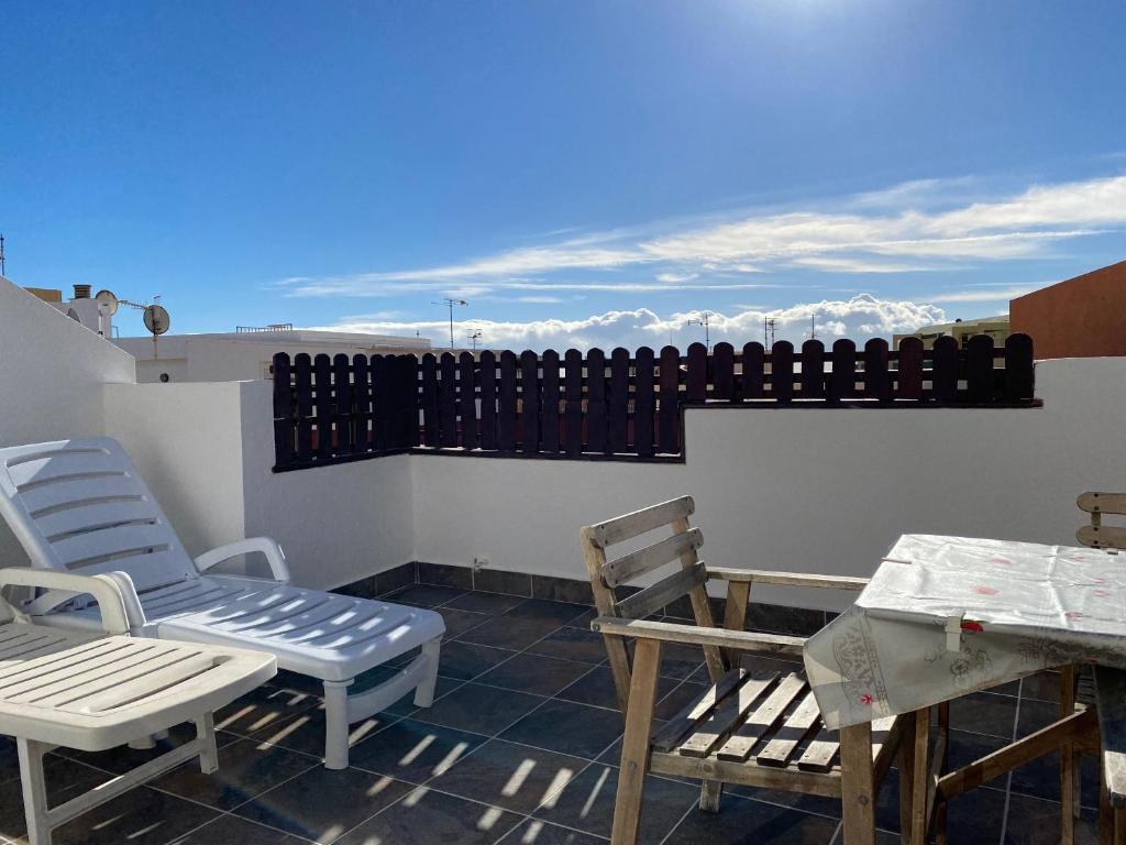 A balcony or terrace at Modern penthouse near the sea