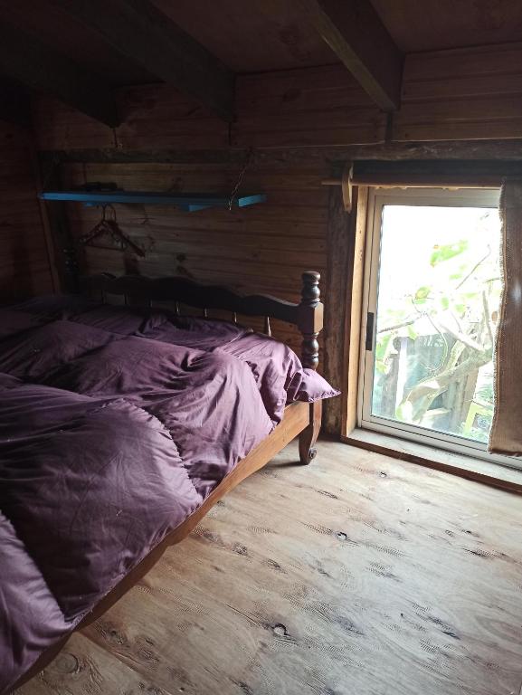 Postel nebo postele na pokoji v ubytování Bunker Hostel