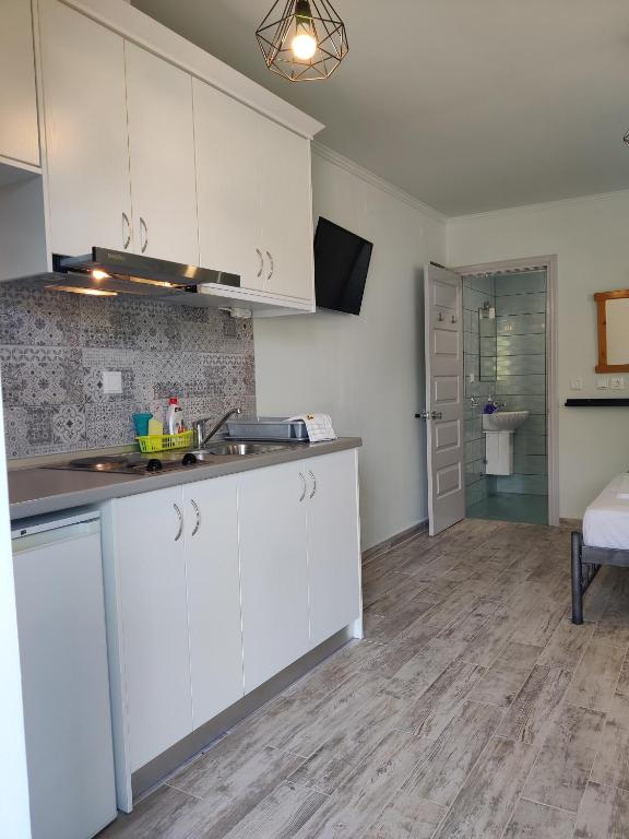 Kuchyň nebo kuchyňský kout v ubytování Villa Margarita