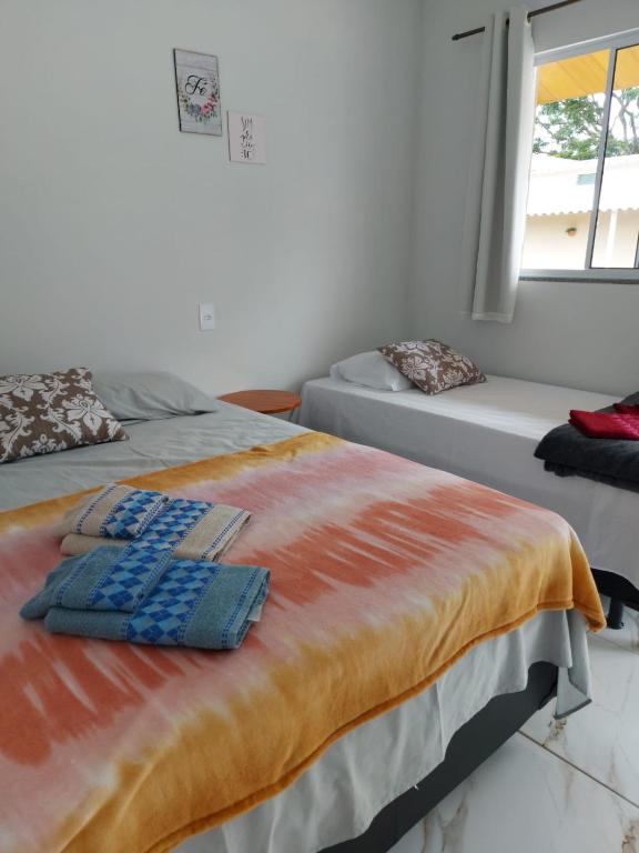 Postel nebo postele na pokoji v ubytování Pousada Ostara