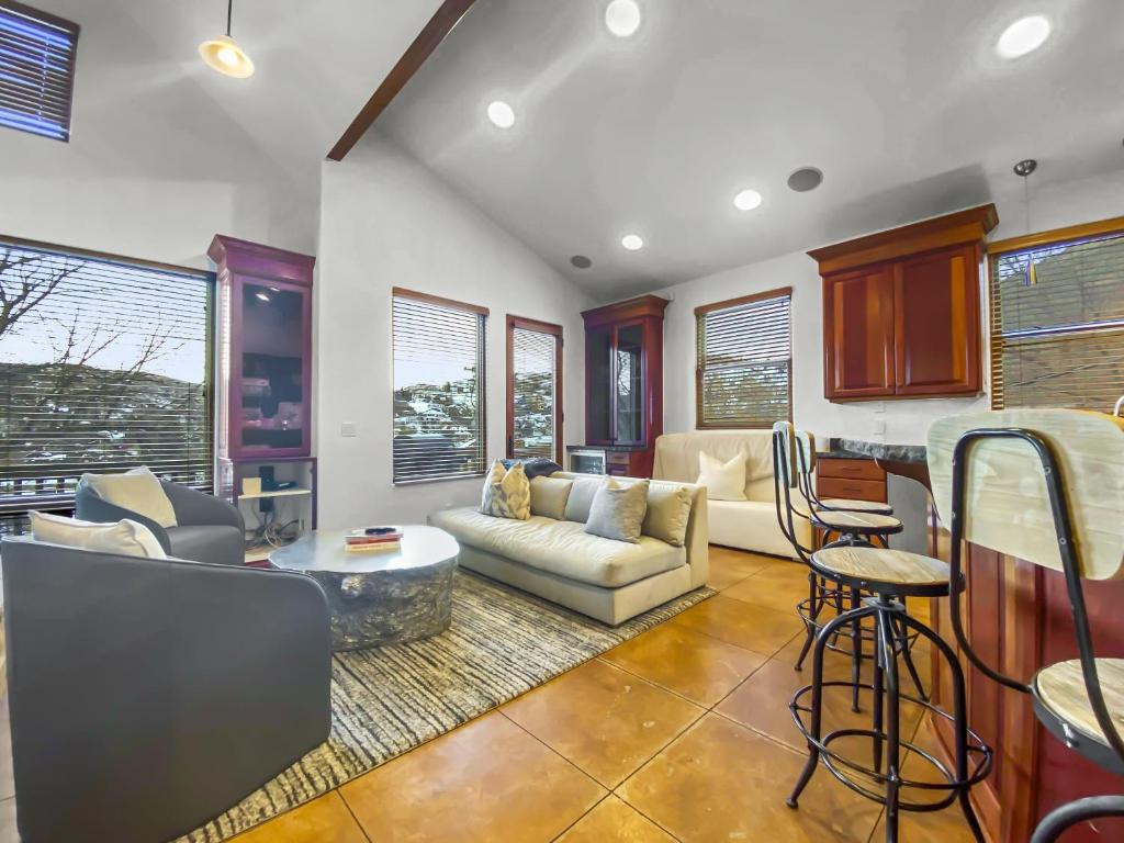 a living room with a couch and a table at 502 A Gold Coast! townhouse in Park City