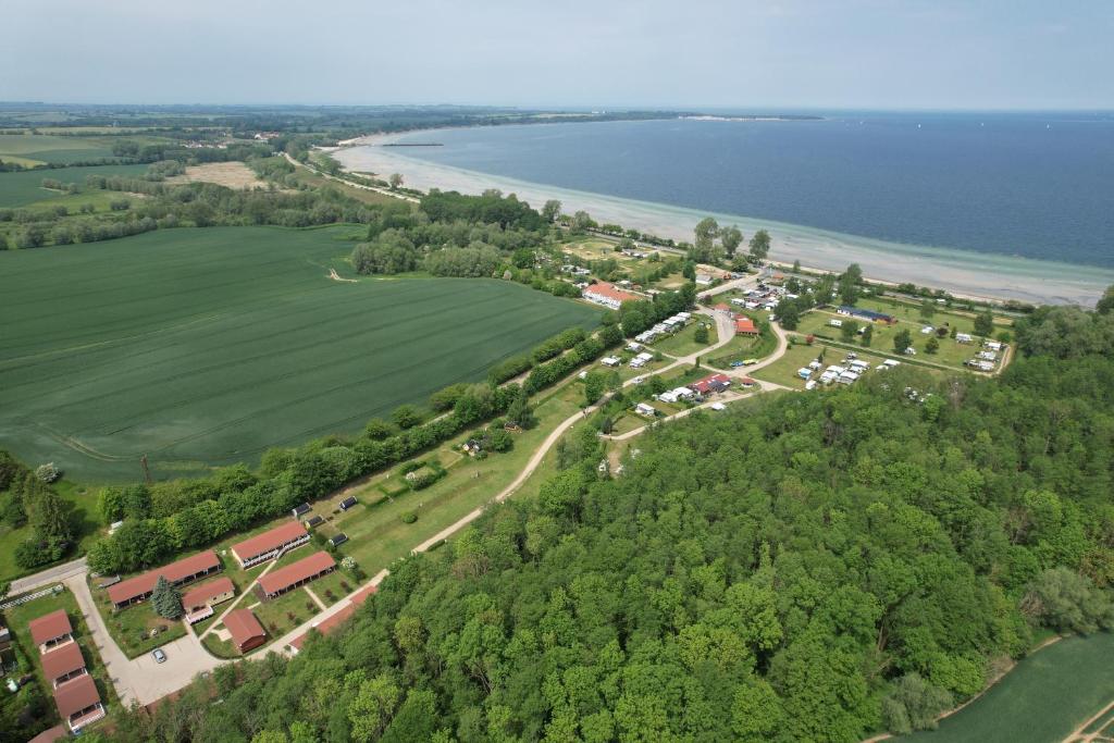 an aerial view of a park next to the water at Bungalows Ostseequelle in Hohenkirchen