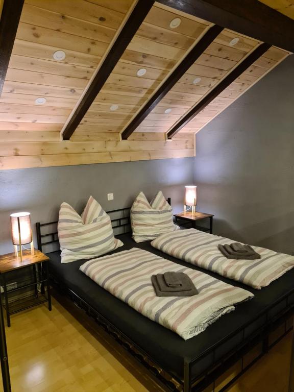 Postel nebo postele na pokoji v ubytování Piratenbucht am Brombachsee