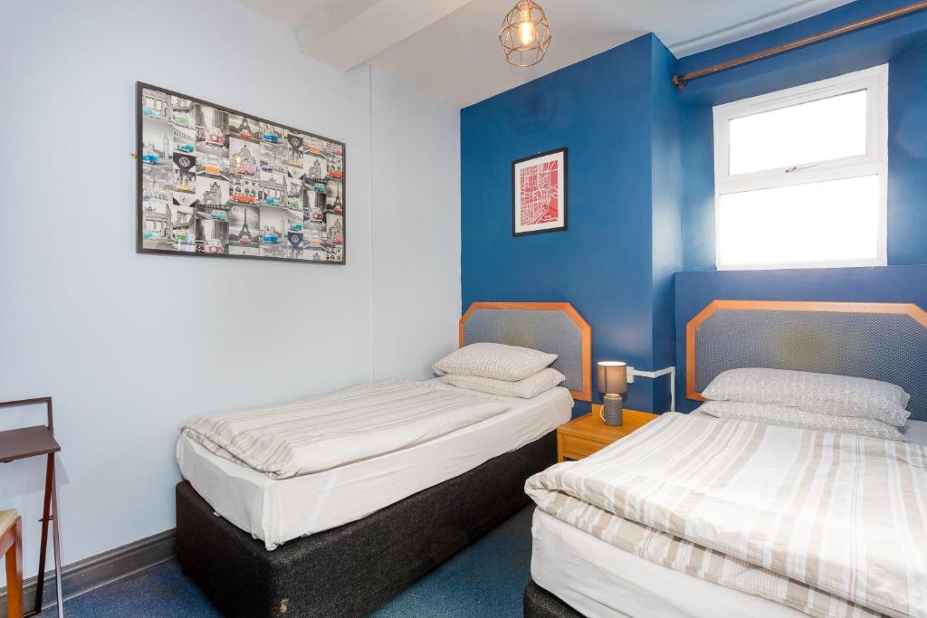 Postel nebo postele na pokoji v ubytování Russell Scott Backpackers - Sheffield