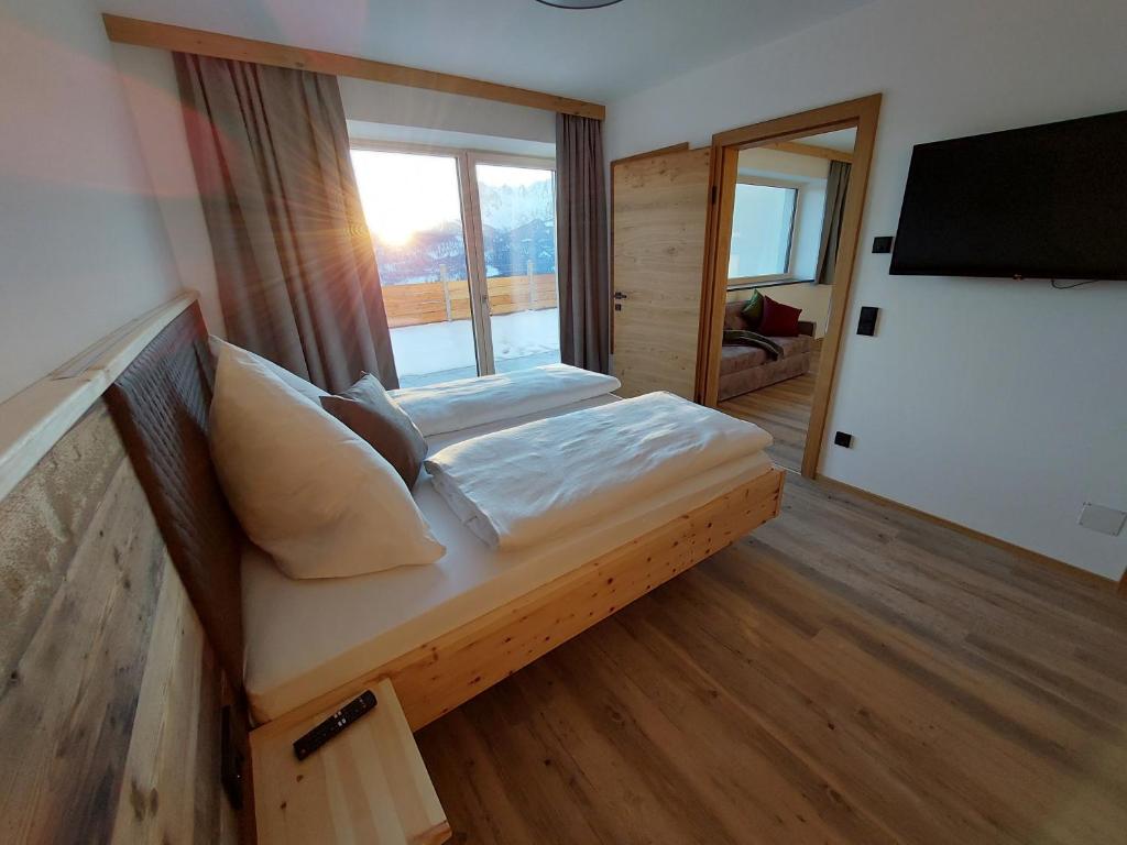 Postel nebo postele na pokoji v ubytování Der Wenger