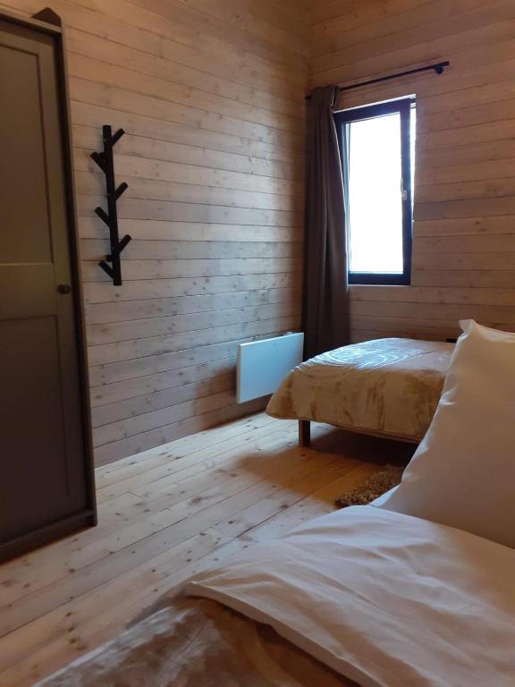 Postel nebo postele na pokoji v ubytování Kuća za odmor Šumska Tišina
