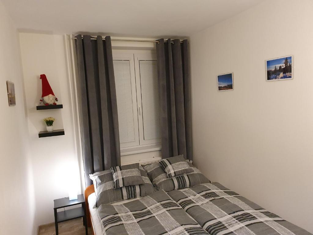 Postel nebo postele na pokoji v ubytování Family apartmán Kovářská