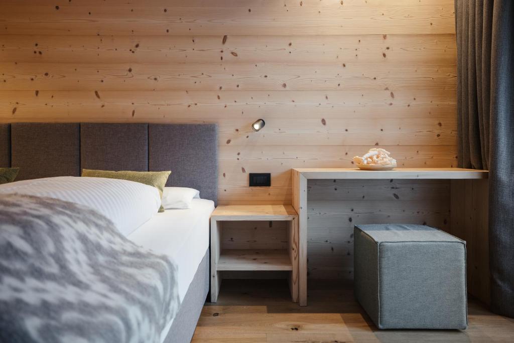 Postel nebo postele na pokoji v ubytování Berghotel Sanví