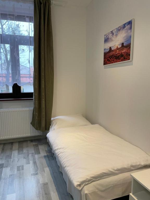 Postel nebo postele na pokoji v ubytování Apartmant T&T