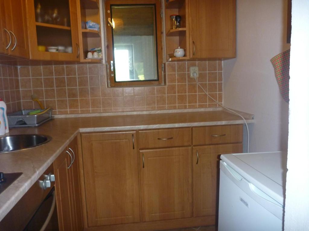 Kuchyň nebo kuchyňský kout v ubytování Chalupa Olšina 31 - Ferienhaus