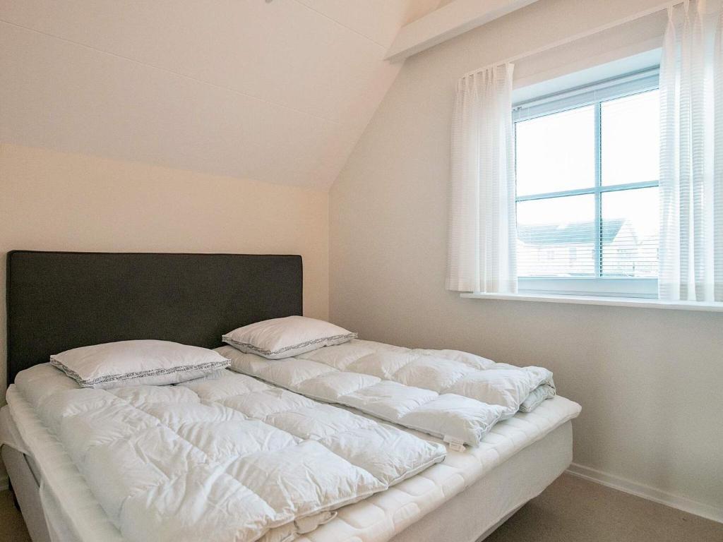 Postel nebo postele na pokoji v ubytování Holiday home Hals CV