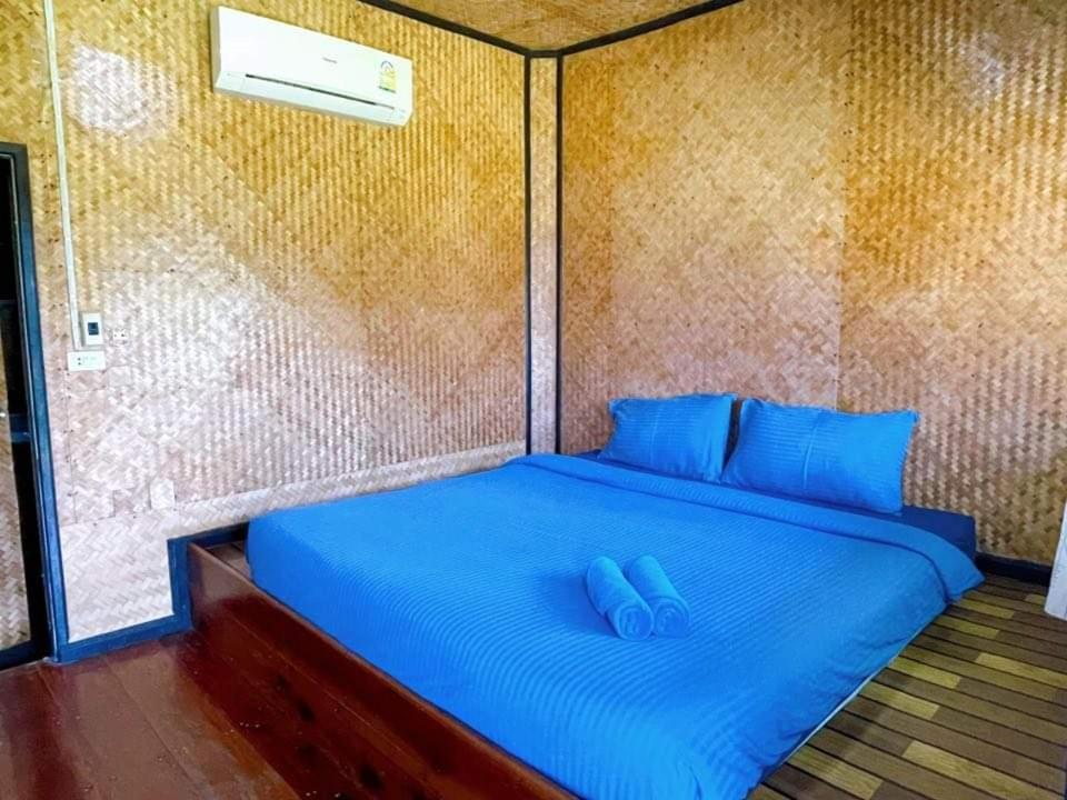 Postel nebo postele na pokoji v ubytování S Beach Resort