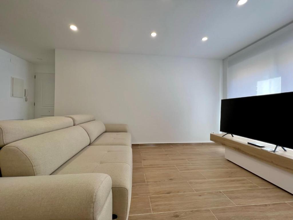TV a/nebo společenská místnost v ubytování Apartamento Sunrise Chapaprieta