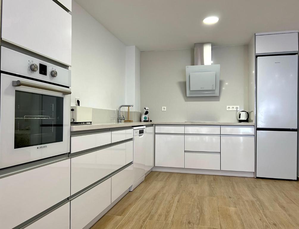 Kuchyň nebo kuchyňský kout v ubytování Apartamento Sunrise Chapaprieta